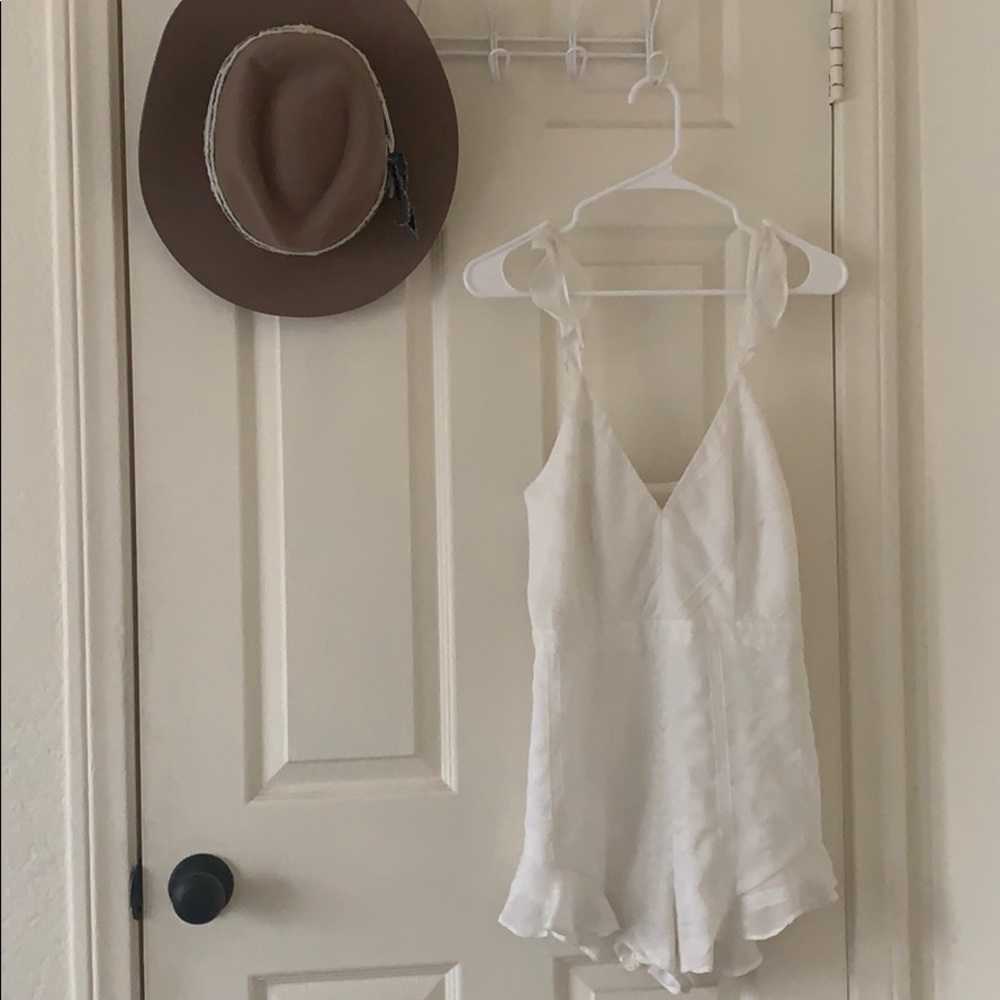 White ruffle hem romper